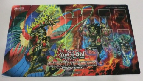 Duelists can win this new Game Mat in the Onslaught of the Fire Kings Structure Deck Tournament!